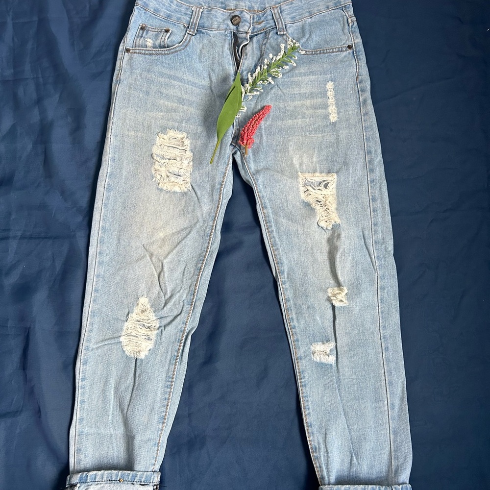 Distressed Light Blue Jeans